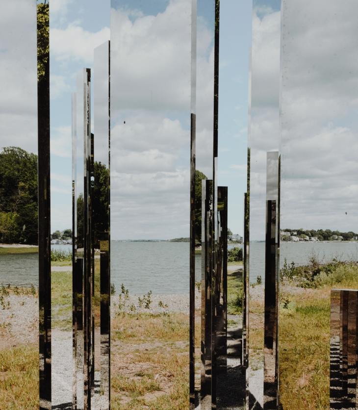 Pillars of mirror in an open space